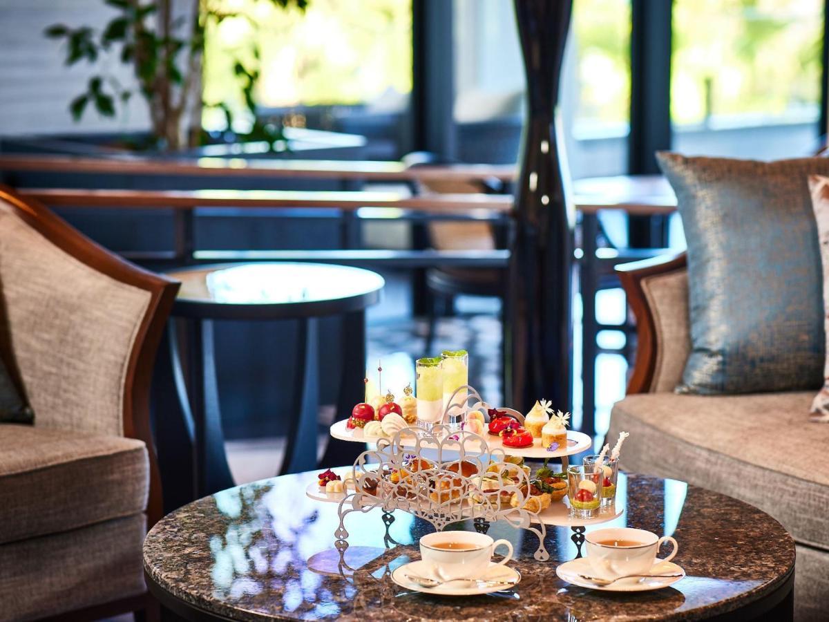 Ryukyu Hotel & Resort Nashiro Beach Itoman Exterior photo Afternoon tea at the hotel